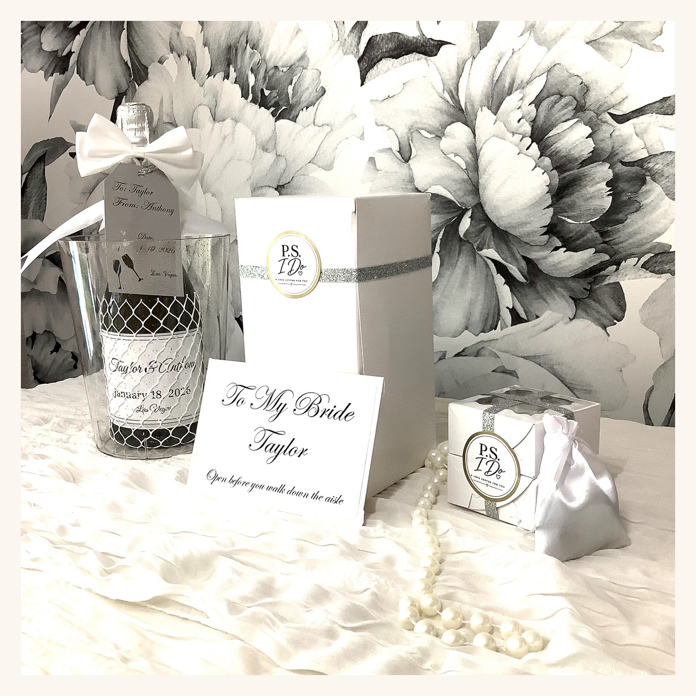 Personalized celebration bottle chilled beside the keepsake box and 'To My Bride' card